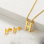 Conjunto mujer acero inoxidable moda letra H