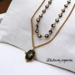 Collar dorado 2 lienzos acero inoxidable ojo piedra negra