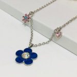 Collar acero inoxidable dijes flor azul