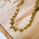 Collar dorado acero inoxidable nudo