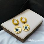 Aretes dorados circulares acero inoxidable ojo