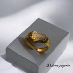 Anillo ajustable dorado acero inoxidable corazon blanco