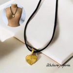 Chocker negro dije acero inoxidable corazon dorado