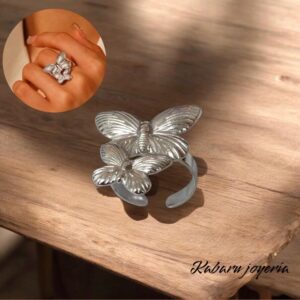 Anillo ajustable color plata acero inoxidable doble mariposa