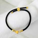 Pulsera negra nylon dije acero inoxidable estrella