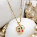 Collar dorado acero inoxidable corazon cerezas