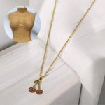 Collar dorado acero inoxidable  cerezas